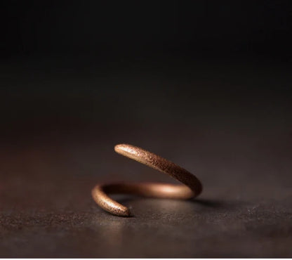 Curved solid copper ring