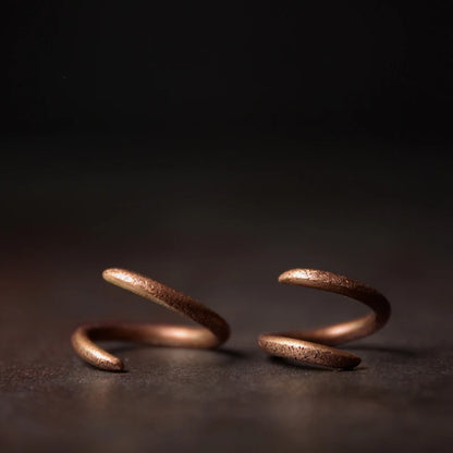 Curved solid copper ring