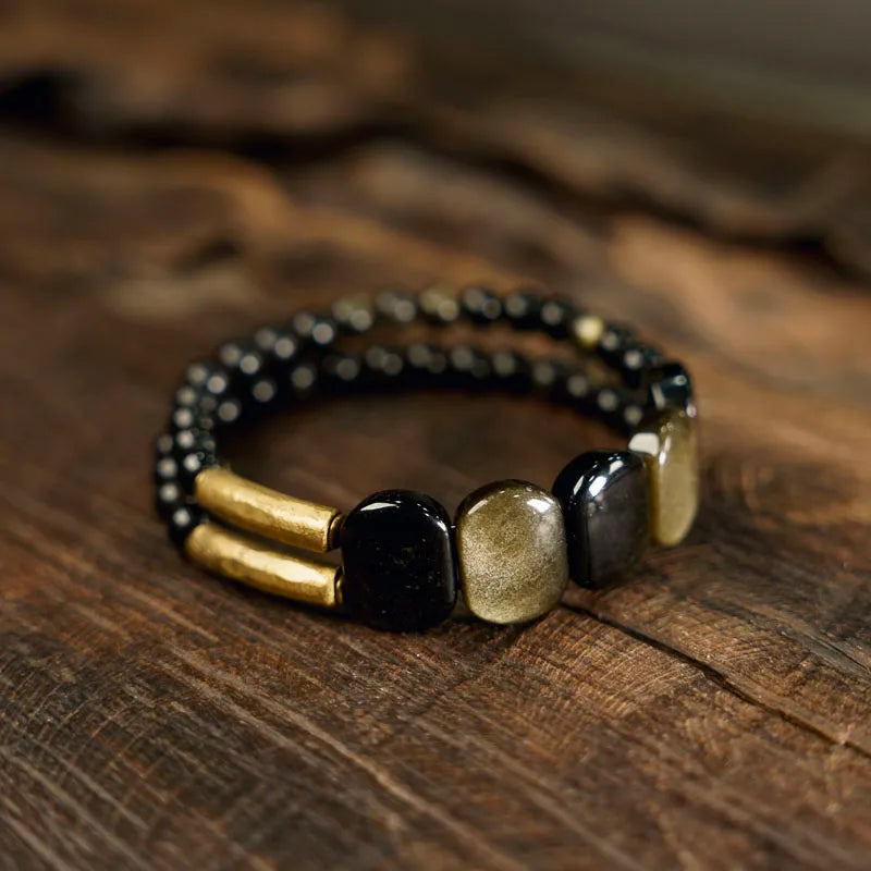 Golden/black obsidian and brass: empowerment & protection