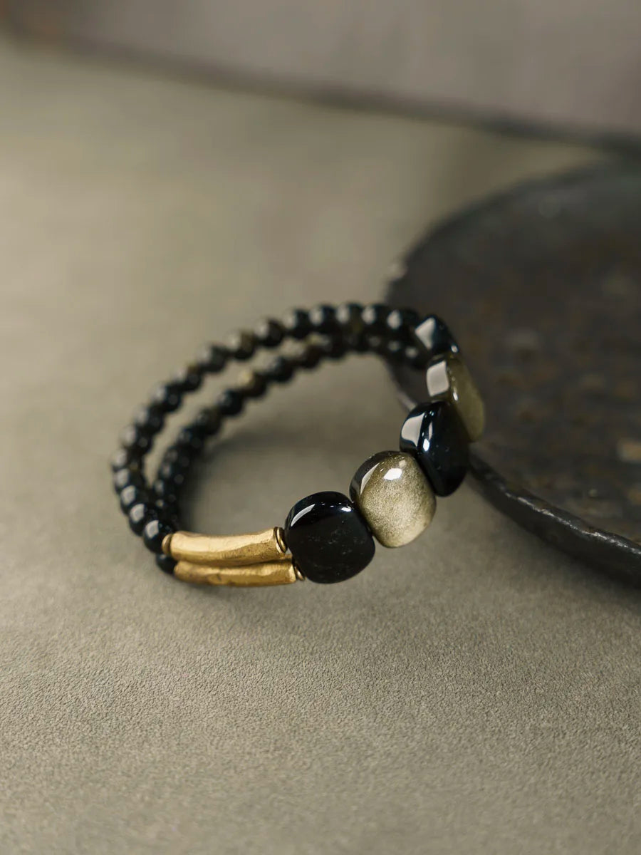 Golden/black obsidian and brass: empowerment & protection